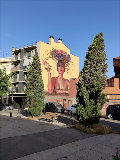 Mural dona cistell fruita