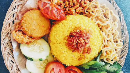 Nasi kuning &amp; Nasi Uduk bu Tari "Spesial Empal"