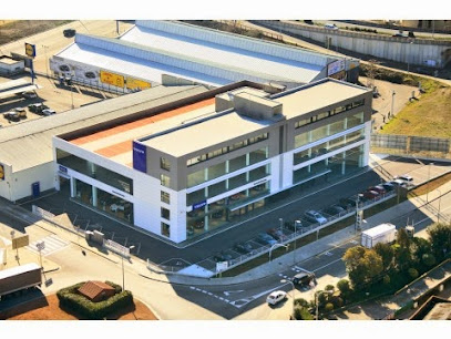 Comercial Autocentre S A